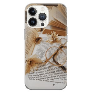 May include: A close-up of a vintage book with a pair of gold-rimmed glasses and a dried flower on top. The book is open to a page with text that reads "aced about an, and rushed... I rushed past. The stones under my feet... and the river was so low that I ran...", and the page number "47" is visible at the bottom.