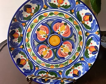 Gorgeous Handmade & Hand-painted Ornamental Plate in Vibrant Blues, Green, and Orange/Peach on a White Background Made in Honduras
