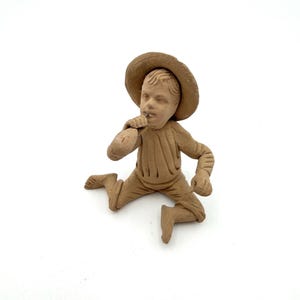Vintage Anna Pottery Clay Boy Figurine, Kirkpatrick Clay Pottery, Anna, Illinois, Ca: 1890s.