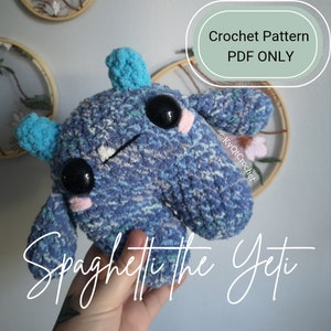 May include: A crochet pattern for a blue and white Yeti named Spaghetti. The pattern is available as a PDF download only. The pattern is by @KYQCrochet.
