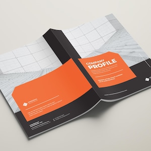 May include: A black and orange company profile brochure with a white geometric pattern on the cover. The text "COMPANY PROFILE" is in white on an orange background.
