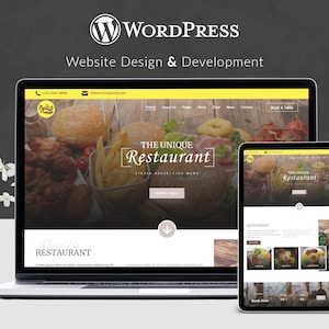 May include: A website design and development company showcasing a website for a restaurant. The website features a yellow and black color scheme with images of food and a "Book a Table" button.