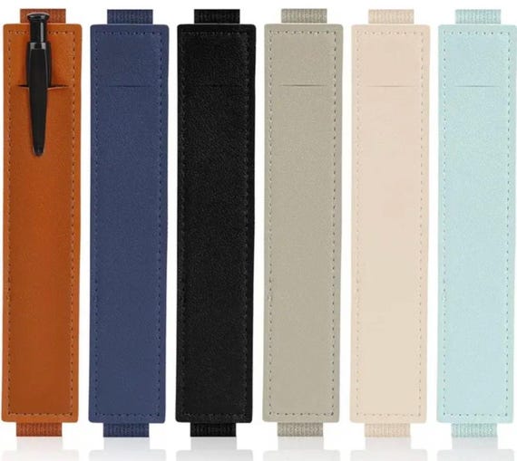 Elastic band pen holder. Can be used on notebooks, journals and planners.
