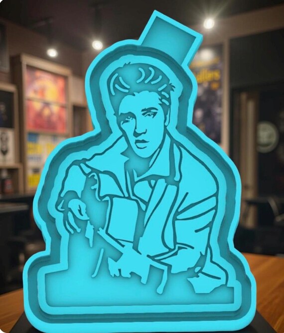 King of rock  car freshie mold or mold housing.