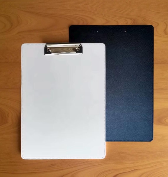 Sublimation clipboard. Sublimation on front and black leather on back.