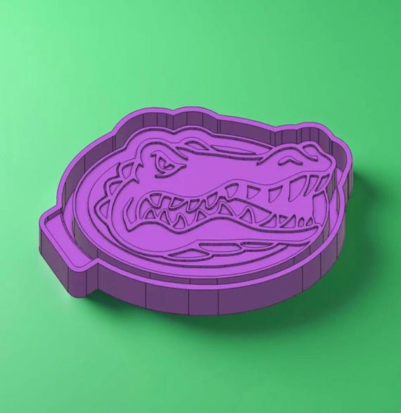 Gator car freshie mold or mold housing.