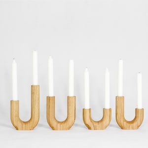 “Meandre” candle holder in solid oak.