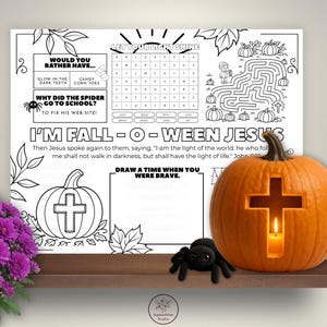 Printable Fall-o-Ween Jesus themed coloring placemat featuring pumpkins, fall leaves, crosses, and Bible verse elements with "Jesus is the Light" and Bo Fear, God is Near message, designed as a kids Christian Halloween alternative activity worksheet.