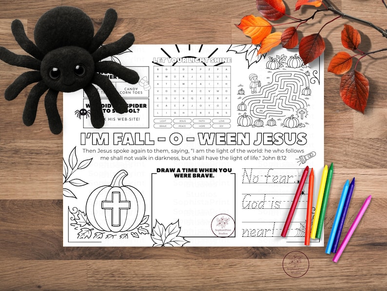 Printable Fall-o-Ween Jesus themed coloring placemat featuring pumpkins, fall leaves, crosses, and Bible verse elements with "Jesus is the Light" and Bo Fear, God is Near message, designed as a kids Christian Halloween alternative activity worksheet.