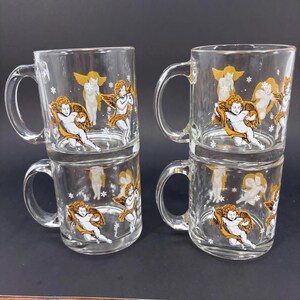 4 tasses à café Angel Sirens fabriquées aux États-Unis en verre transparent - Excellent état. image 1