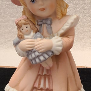 Vintage Victorian Girl with Doll figurine