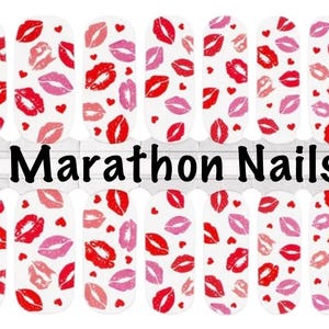 May include: Nail wraps with a white background, featuring red and pink lip prints and small red hearts. The text "Marathon Nails" is displayed in black.