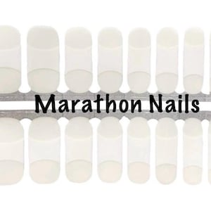 May include: A set of three ceramic mugs with a speckled, matte finish. The mugs are in shades of cream, light brown, and dark brown. Each mug has a simple, minimalist design, perfect for coffee or tea.