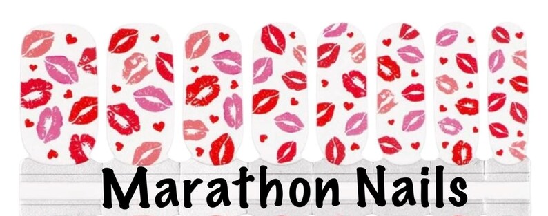 May include: White nail wraps with a pattern of red and pink lips and small red hearts. The words "Marathon Nails" are printed in black at the bottom of the image. These nail wraps are designed for easy application.