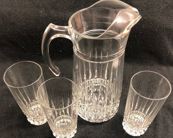 Vintage and elegant Cristal D'Arques crystal pitcher and three matching glasses from France