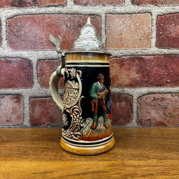 Vintage Marzi And Remy DBGM 16 Ounce Embossed German Brauhaus Tavern Scene Beer Stein Mug With Hinged Pewter Lid