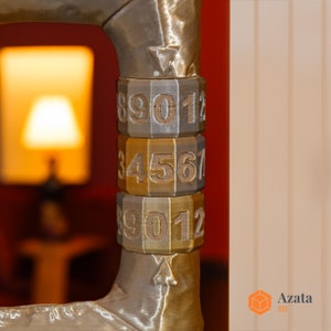 a close up of a metal object with numbers on it