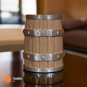 a cake made to look like a barrel sitting on a table