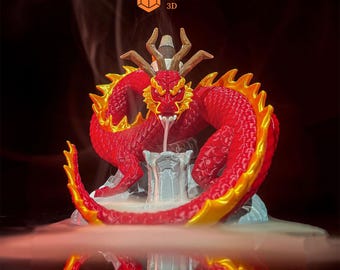 May include: Red and gold dragon incense burner with smoke rising from the top. The dragon is curled around a white stone base. The text "Azata 3D" is visible in the top right corner of the image.