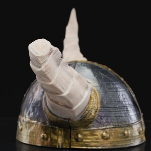 a close up of a helmet on a table