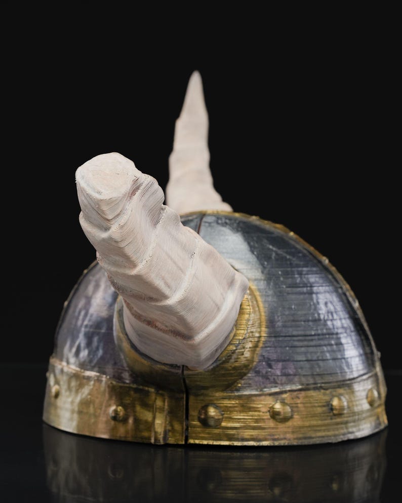 a close up of a helmet on a table
