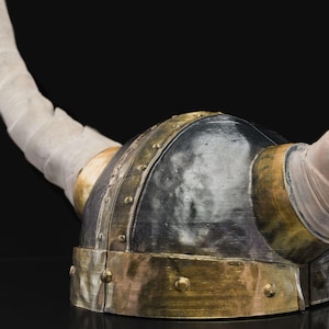 a close up of a helmet on a table