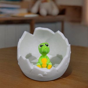 Cute Dinosaur in Broken Egg Shell Trinket Dish | Adorable Cartoonish Animal Dino Egg Jewelry Holder | Prefect for Ring, Necklace & Key