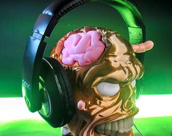 Supporto per cuffie zombie / Esclusivo espositore da scrivania e da gioco infestato / Supporto per telefono con testa di morto spettrale / Arredamento minimalista per la casa per gli amanti degli zombie