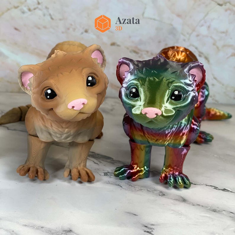 a couple of toy animals sitting on top of a table
