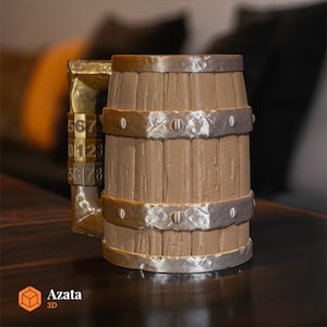 a wooden barrel sitting on top of a wooden table