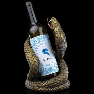 a bottle of wine with a snake on it
