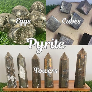 May include: An assortment of pyrite stones in various shapes. The image displays pyrite eggs, cubes, and towers. The pyrite has a metallic, gold-like appearance. The word "Pyrite" is written in a decorative font, with the words "Eggs", "Cubes", and "Towers" labeling the shapes.