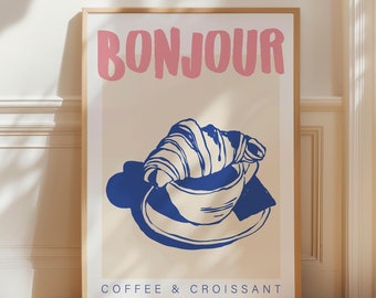 May include: A poster with the text "BONJOUR COFFEE & CROISSANT" in pink and blue lettering. The poster features a blue illustration of a croissant and a cup of coffee on a plate.