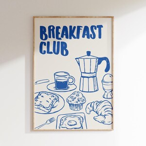 May include: Blue and white illustration of a breakfast spread with the text "Breakfast Club". The illustration includes a coffee pot, a cup of coffee, a slice of toast, a muffin, a croissant, and a fried egg.