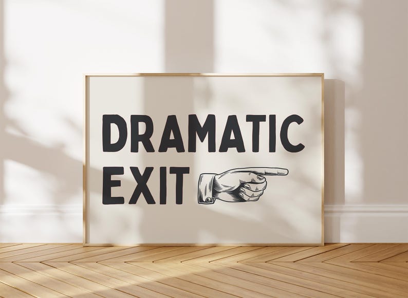 May include: A white poster with black text that reads "Dramatic Exit" and a black and white illustration of a hand pointing to the right.