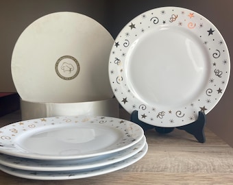 Pampered Chef "Celebration" dessert plates set of 4 from 1996 featuring gold stars and swirls