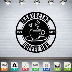 Könnte beinhalten: Schwarzweißes kreisförmiges Design mit dem Text "Marybeth's Coffee Bar" und "Est 2023". In der Mitte des Kreises befindet sich ein stilisiertes Bild einer Kaffeetasse mit aufsteigendem Dampf.