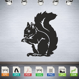 May include: Black silhouette of a squirrel with its tail curled around its body. The squirrel is facing left and appears to be holding a nut in its paws.