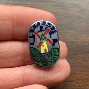 N. F. B. S. S Vintage enamel lapel pin Magic aladins lamp and windmill