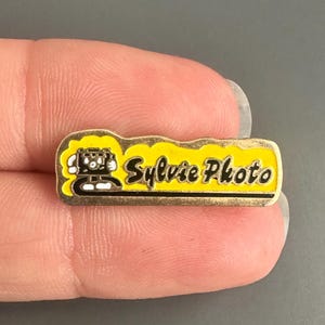 Sylvie Photo Camera Film cartridge 35mm Vintage enamel lapel pin badge brooch