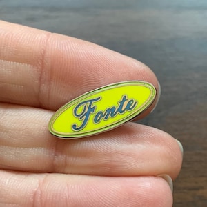 Fonte enamel lapel pin badge yellow blue Ford brand