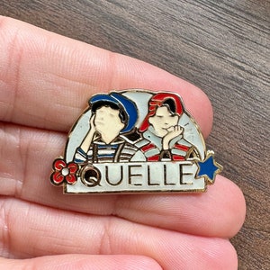 Quelle French fashion store magazine catalogue enamel lapel pin