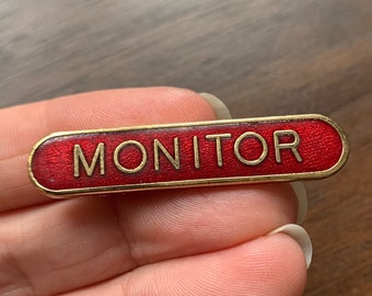 Vintage Red enamel Monitor Pin badge