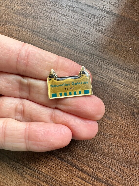 Nouvelles Galeries Reims Lafayette fashion department store France enamel lapel pin badge