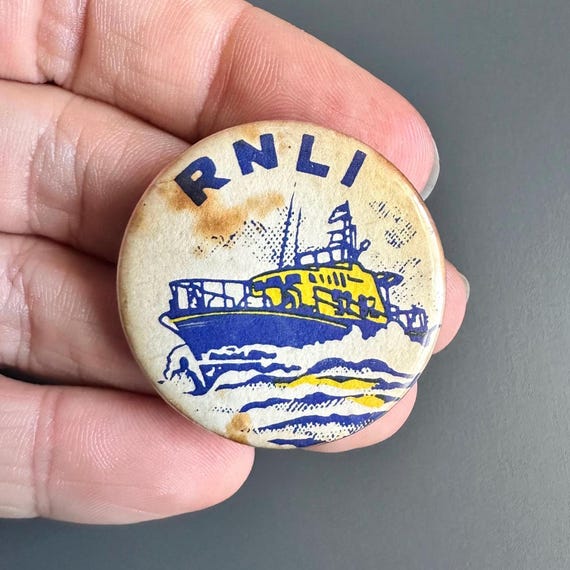1970s Boating RNLI Help Lifeboats button lapel pin badge brooch - supporting charity Royal National Lifeboat Institution