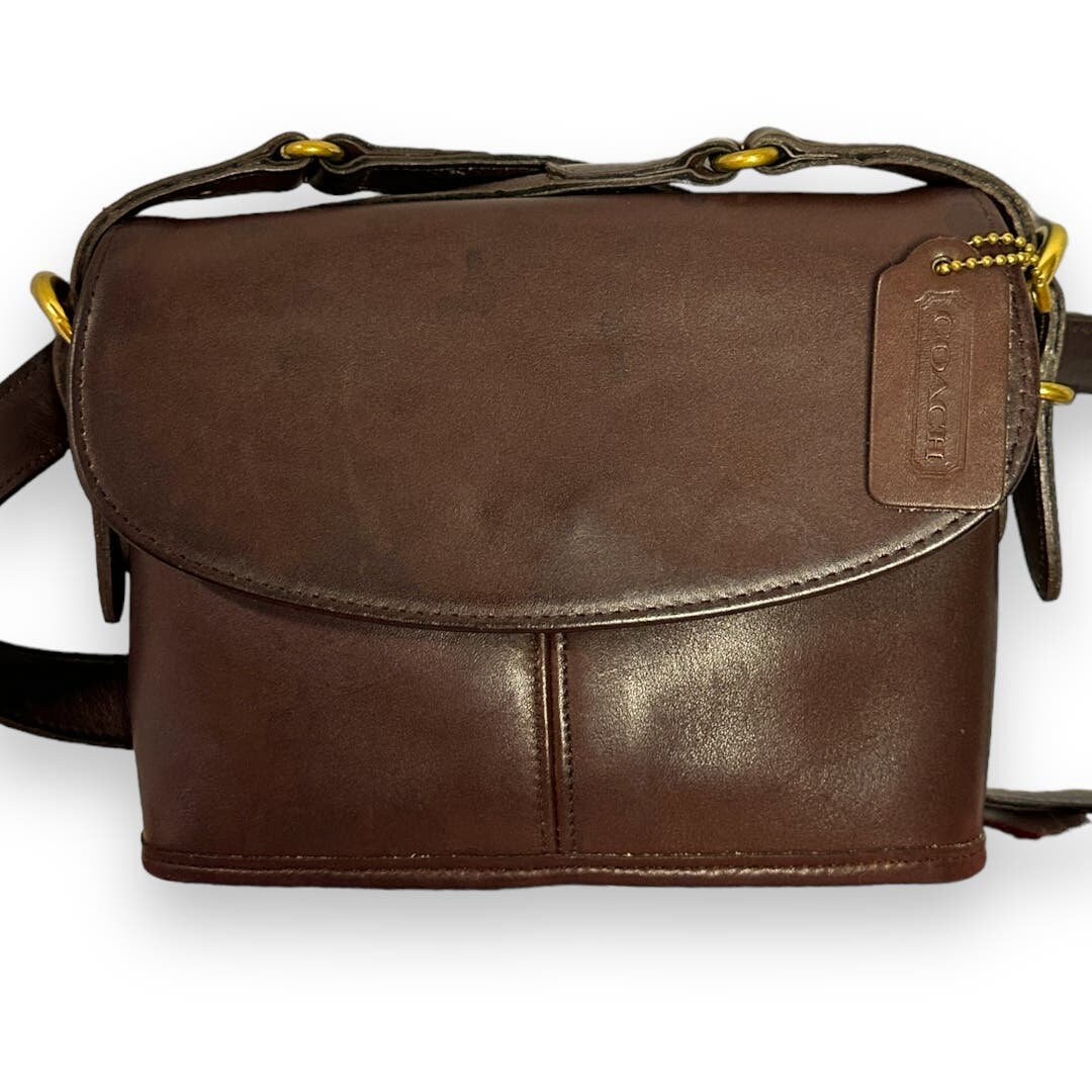 Brown leather crossbody bag coach top