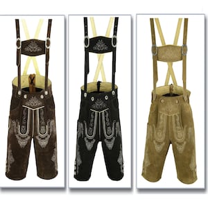 May include: Three pairs of lederhosen in brown, black, and tan. Each pair has suspenders with a decorative buckle and embroidered details.