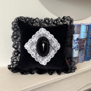 Black velvet doily lace silver bird skull braided frame frilly lace trim cushion