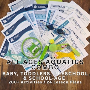May include: A collection of swimming lesson plans and aquatic teaching materials including printed guides, blue goggles, a green ring, a small yellow duck, a green stick, and two fabric fish toys with the text ALL AGES AQUATICS COMBO displayed.