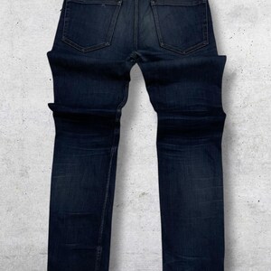 Acne Studios donkerindigo denim W28 | Minimalistische slimfit jeans | Scandinavische ontwerper afbeelding 9